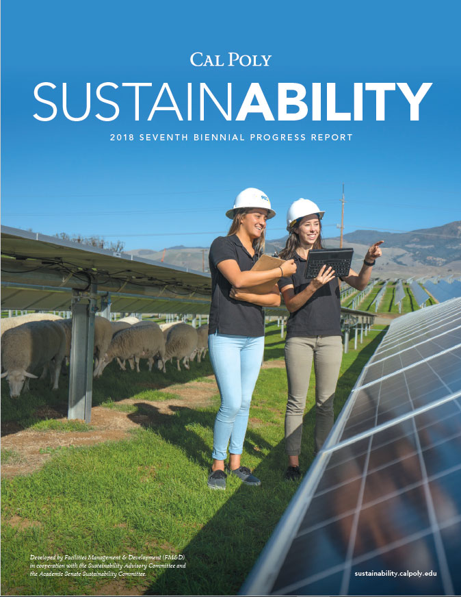 cover of the biennial report, women wearing hard hats in the Cal Poly Solar Farm