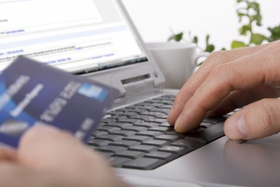 Person entering credit card information