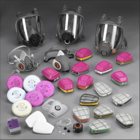 Various types of respiratory gear layed out on a flat surface.